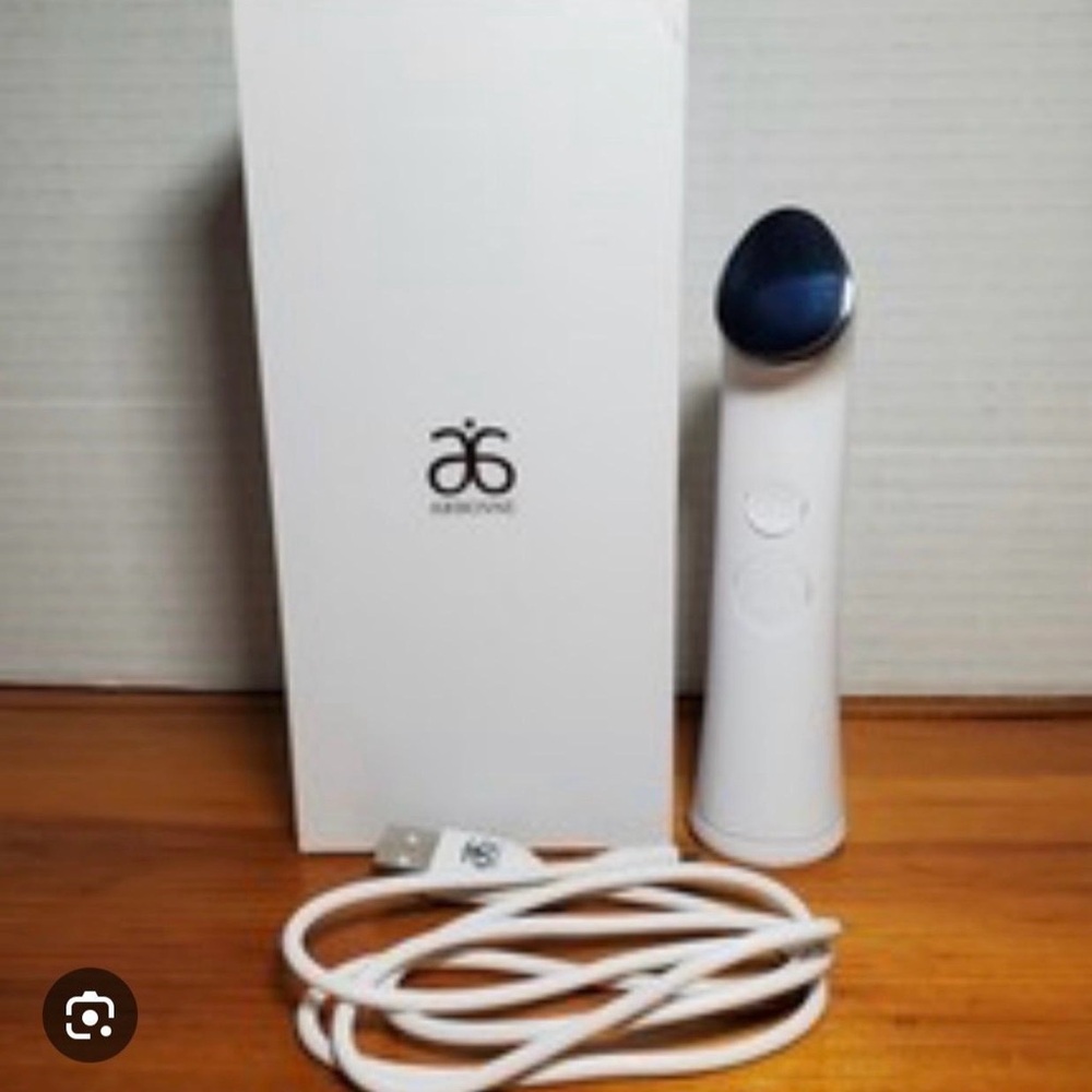 Arbonne White and Silver Skincare Device
